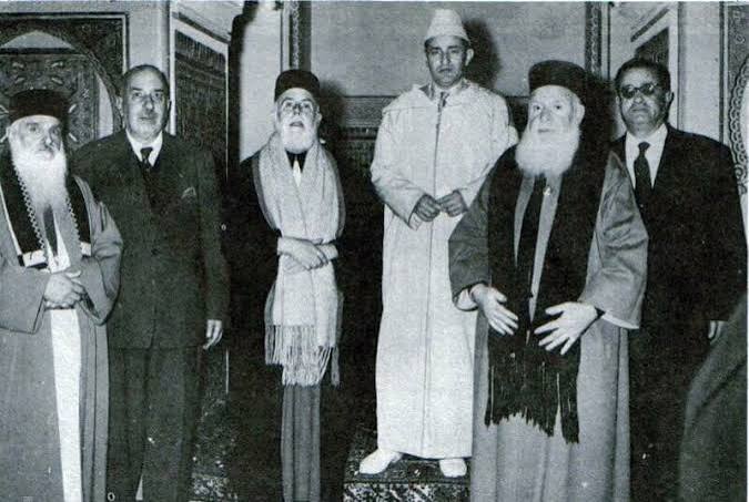 Sultan Mohammed V with Moroccan rabbis — documenting the Sultan's sustained engagement with Jewish religious leadership during the Protectorate period